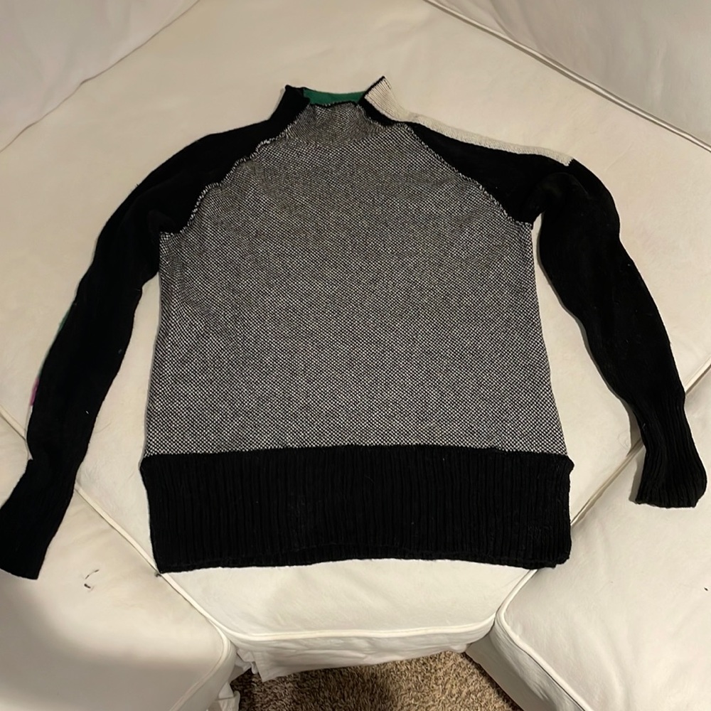 Never worn! Not my style or color! Husband accidentally washed, has some lint!